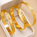 24K Gold Plated Stackable Bangles, Diamond-Cut Engraved Statement Bracelet Sets.
